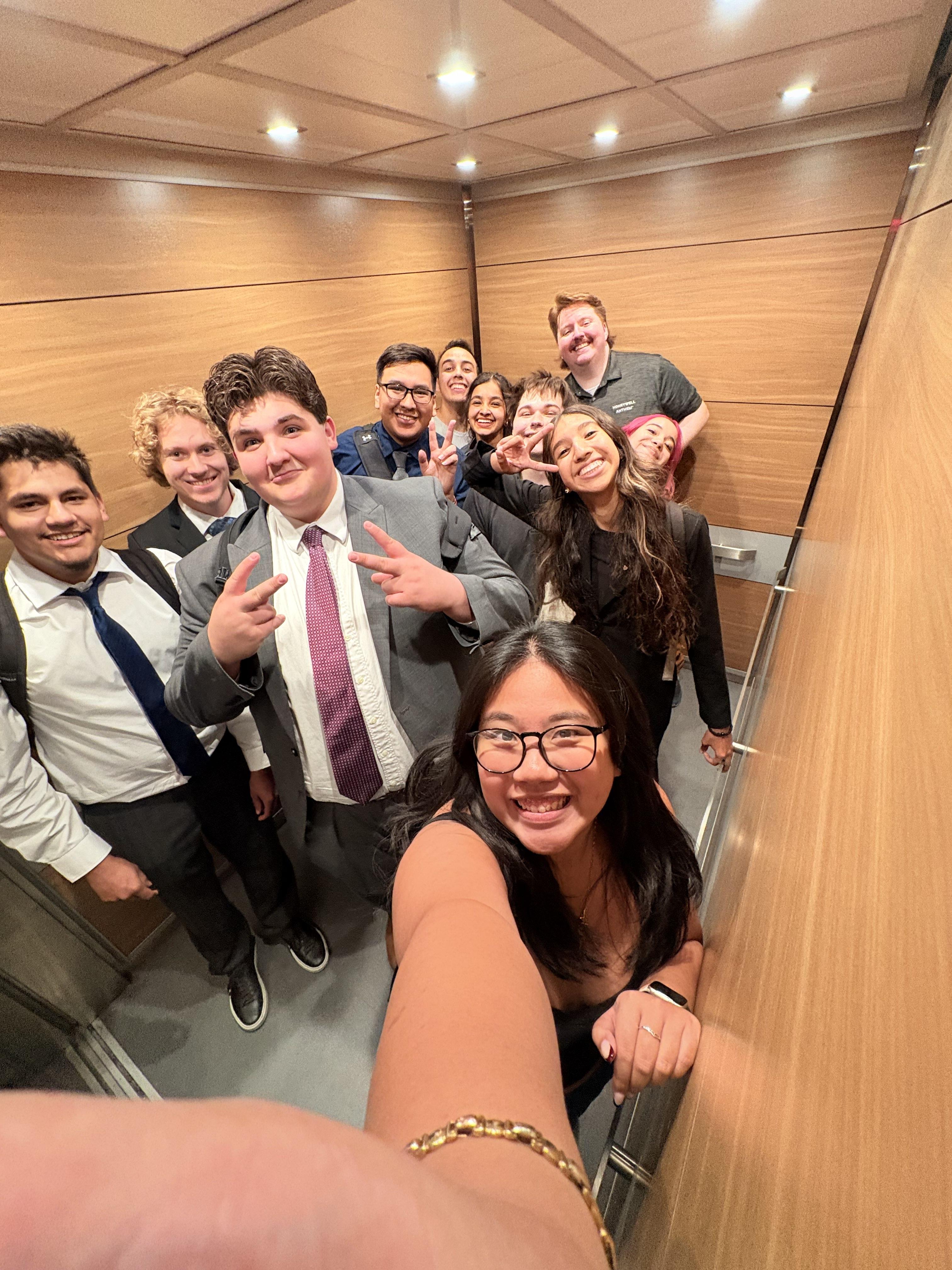 Theta Tau brothers standing on campus